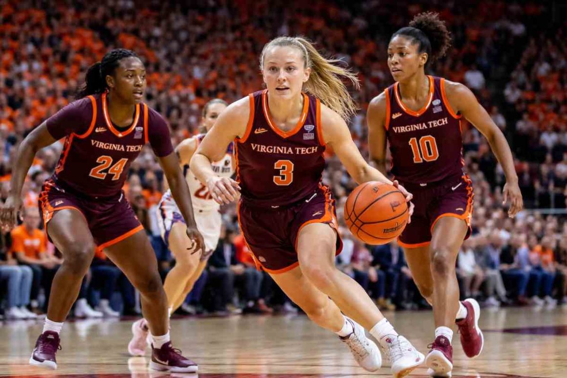 Virginia Tech Hokies women’s basketball players in an intense game moment on court