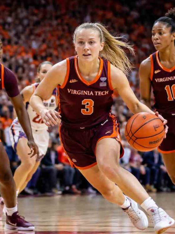 Virginia Tech Hokies women’s basketball players in an intense game moment on court